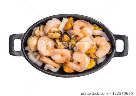 Ready for cooking fresh Raw Seafood Cocktail with Mussels, Clams, Prawns, Shrimps and squid in skillet isolated on white background. top view 122870650