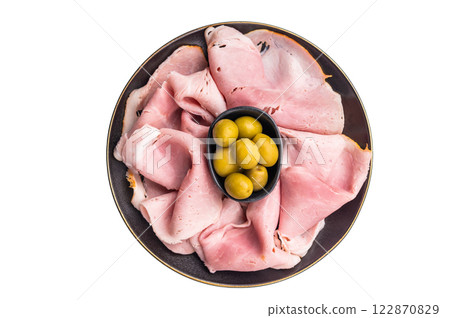 Meat appetizer with Sliced Prosciutto Cotto ham and green olives isolated on white background. top view 122870829