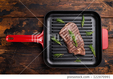 Grilled beef Top sirloin steak or Rump steak in grill pan. wooden background. top view 122870991