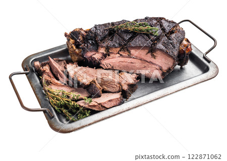 Roasted game meat of Venison, baked leg of roe deer on a tray with herbs isolated on white background. top view 122871062