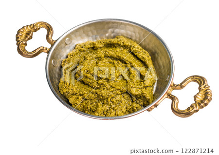Basil Pesto sauce, Iitalian sauce in a skillet isolated on white background 122871214