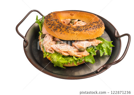 Bagel with cream cheese and smoked salmon, lox in a tray isolated on white background 122871236
