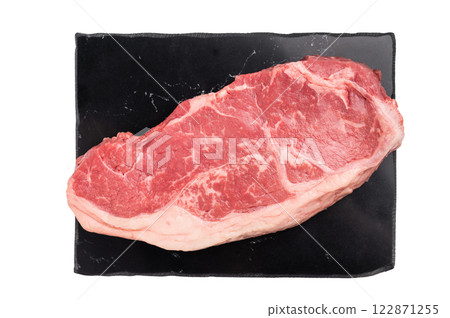 Raw striploin beef steak, New York strip steak isolated on white background Raw striploin beef steak, New York strip steak isolated on white background 122871255