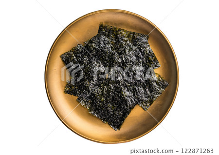 Nori seaweed sheets on a plate isolated on white background. top view 122871263