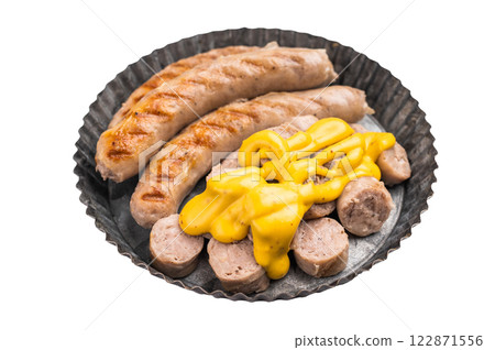 Grilled Bratwurst Sausages with cheese sauce in plate isolated on white background. top view 122871556