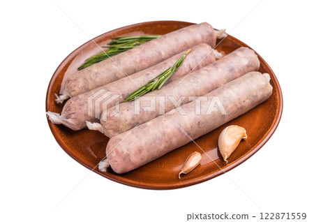 Raw Sausages with forcemeat mincemeat with herbs in plate isolated on white background. top view Raw Sausages with forcemeat mincemeat with herbs in plate isolated on white background. top view 122871559