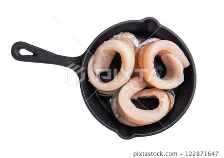 Ready for cooking Raw Pollock fish fillets in pan with herbs isolated on white background. top view 122871647