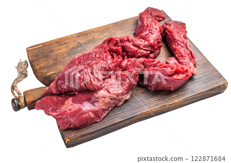 Uncooked Beef Skirt Steak, also name Machete steak, raw meat on cutting board isolated on white background 122871684