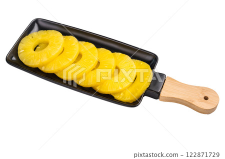 Canned Pineapple rings slices on a board isolated on white background. top view 122871729