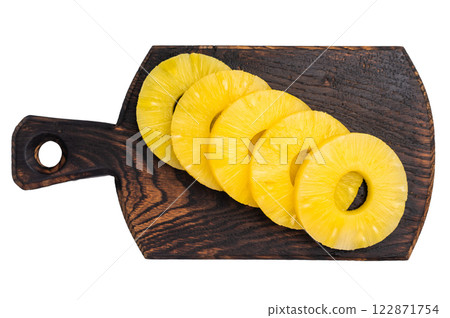 Canned Pineapple rings slices on a board isolated on white background. top view 122871754