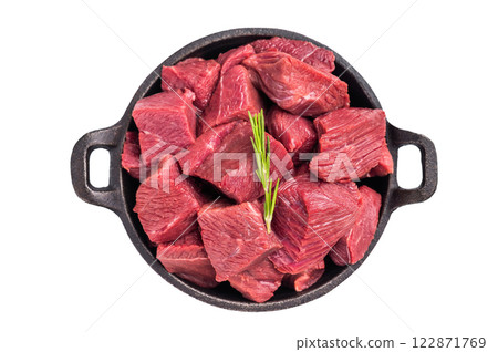 Diced Raw Ostrich meat, uncooked Game Meat isolated on white background. top view Diced Raw Ostrich meat, uncooked Game Meat isolated on white background. top view 122871769