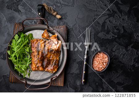 Roasted Teriyaki salmon fillet with salad. black background. top view Roasted Teriyaki salmon fillet with salad. black background. top view 122871855