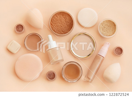 Varieties of face powders and foundations for perfect complexion, basic make up products to even out and matte skin, beauty cosmetics with brushes and sponges 122872524