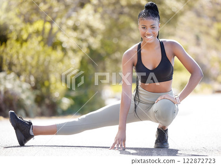 Stretching legs, fitness portrait and black woman training for marathon in nature, running for cardio exercise and happy with workout in park during summer. Girl runner start with stretch for sport 122872723
