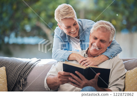 Mature couple, bond and funny book on house or home sofa in garden and backyard patio. Smile, happy or relax senior man and elderly woman in retirement hug, trust or security love marriage with novel Mature couple, bond and funny book on house or home sofa in garden and backyard patio. Smile, happy or relax senior man and elderly woman in retirement hug, trust or security love marriage with novel 122872862