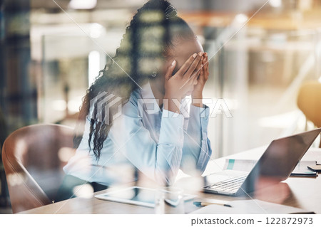 Stress, anxiety and burnout with a business woman suffering with mental health in her office at work. Headache, fatigue and overtime with a stressed female employee at work on a laptop at her desk 122872973