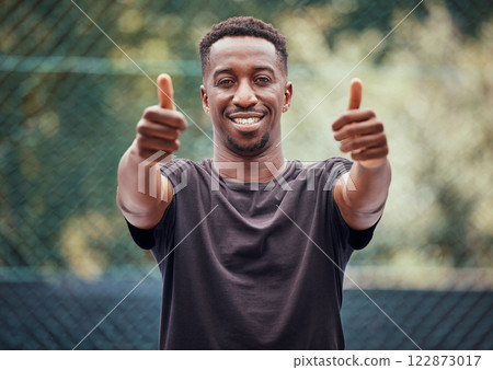 Sport thumbs up, sports man success and fitness support hands sign of exercise athlete. Portrait of athletic player happy, smile and exercise goal motivation with a yes, thank you and winner gesture Sport thumbs up, sports man success and fitness support hands sign of exercise athlete. Portrait of athletic player happy, smile and exercise goal motivation with a yes, thank you and winner gesture 122873017