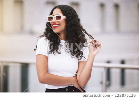 Beauty, fashion and sunglasses with woman in city outdoor for vision, cosmetics or travel. Summer, motivation and makeup with young female influencer in urban street for happy, content or lifestyle 122873126