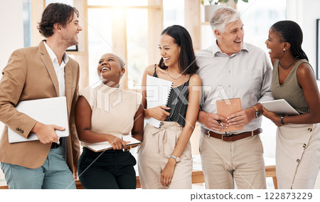 Laughing, global company or teamwork collaboration of marketing men or women diversity in creative startup office. Happy smile or comic business people and technology, paper or documents for about us Laughing, global company or teamwork collaboration of marketing men or women diversity in creative startup office. Happy smile or comic business people and technology, paper or documents for about us 122873229