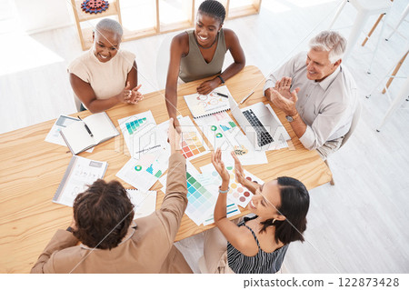 Handshake, welcome and thank you with business people shaking hands and their team in celebration with applause. Teamwork, b2b and achievement with a work group reaching an agreement, deal or goal Handshake, welcome and thank you with business people shaking hands and their team in celebration with applause. Teamwork, b2b and achievement with a work group reaching an agreement, deal or goal 122873428