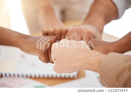 Fist bump, collaboration and team building after a business meeting on planning, diversity and our vision as a company. Global, mindset and solidarity as a group with motivation, hands and goals 122873457