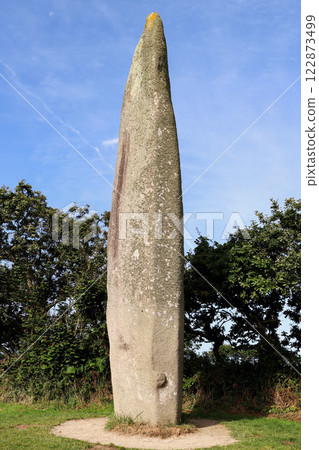 Menhir Kerloas is a famous ancient standing stone in Brittany, France. 122873499