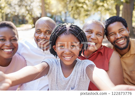 Black family, selfie and smile of child taking a picture with her parents and grandparents outside at a park in nature. Portrait of a girl having fun, love and bonding with family feeling happy Black family, selfie and smile of child taking a picture with her parents and grandparents outside at a park in nature. Portrait of a girl having fun, love and bonding with family feeling happy 122873776