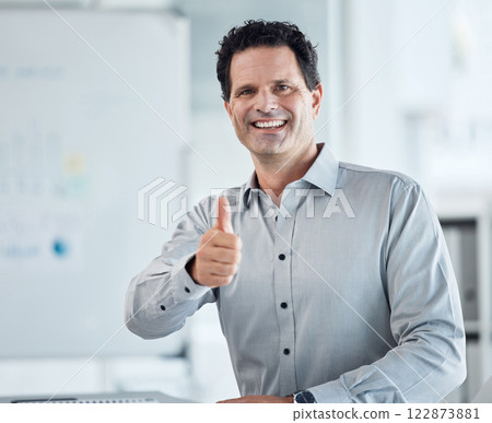 Portrait of happy business man with thumbs up or smile for good work and congrats on job promotion success. Yes or motivation from marketing or advertising employee worker for target goal achievement 122873881