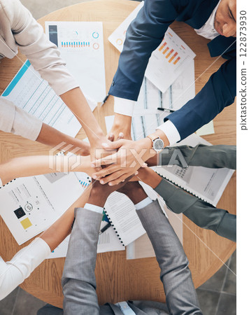 Team hands, support and work motivation of business workers working with financial data. Finance collaboration, teamwork and accounting employee group together planning a project with tax documents Team hands, support and work motivation of business workers working with financial data. Finance collaboration, teamwork and accounting employee group together planning a project with tax documents 122873930