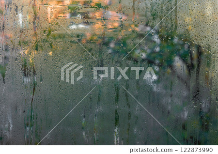 wet glass. drops of water on the window 122873990