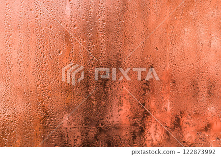 the background is wet glass. 122873992