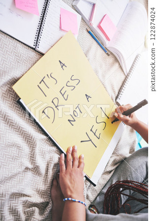 Woman activism, writing and sexual assault protest message for bold and angry statement poster. Girl sharing opinion and thought about rape problem with frustrated, protesting words on paper. 122874024