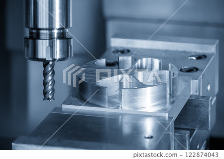 The CNC milling machine cutting aluminum part by solid flat nose end mill tool. The CNC milling machine cutting aluminum part by solid flat nose end mill tool. 122874043