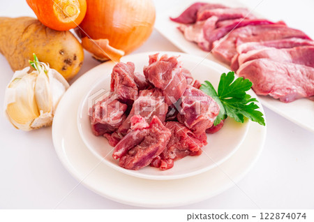 Pig head and vegetables Pig head and vegetables 122874074