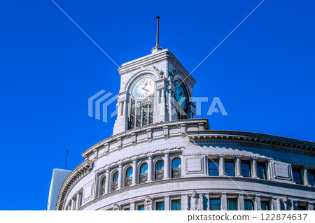 Tokyo cityscape, Japan. A view of Seiko House Ginza reflecting sunlight. A ray of hope for a new era. February 8th. 122874637