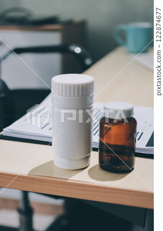 stethoscope on a report stethoscope on a clipboard stethoscope on a book 122874677