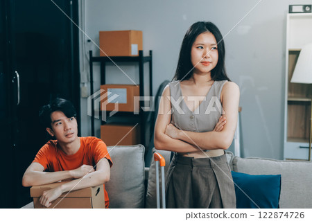Stressed young married family couple arguing, blaming each other Stressed young married family couple arguing, blaming each other 122874726