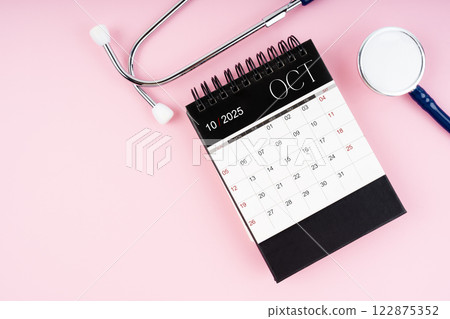 October 2025 calendar and stethoscope, Medical appointment schedule to check up. 122875352