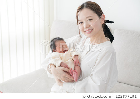 Baby family hugged by mom and sleeping 122877191