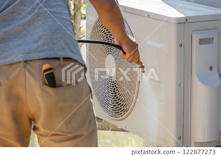 air conditioning compressor outdoor unit cleaning service with water spray air conditioning compressor outdoor unit cleaning service with water spray 122877273