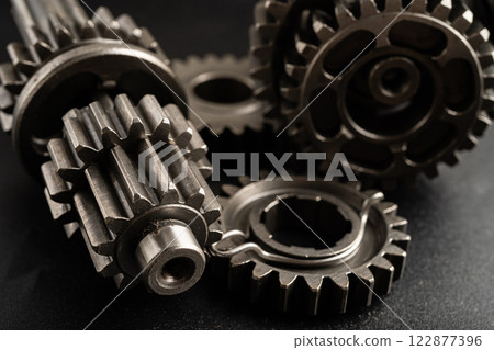 Gear and cogs wheels, clock mechanism, brass metal engine industrial. 122877396