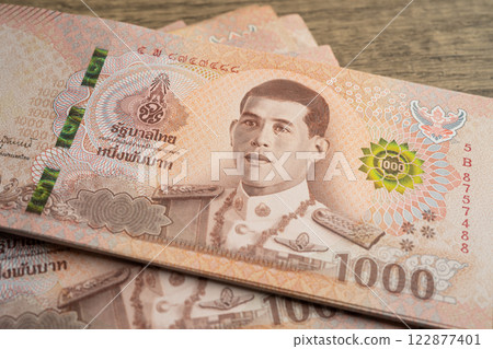 Thai baht banknotes, business saving finance investment concept. Thai baht banknotes, business saving finance investment concept. 122877401