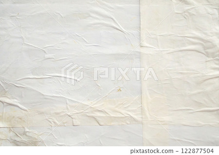 white crumpled and creased glued wrinkled paper poster texture background 122877504