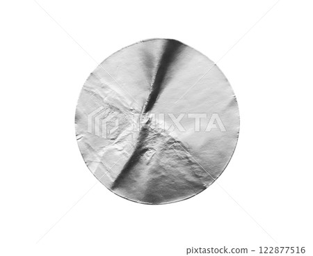 Blank silver round adhesive paper metallic sticker label isolated on white background 122877516