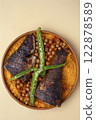 Top view of Tunisian couscous with fish 122878589