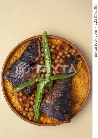 Top view of Tunisian couscous with fish Top view of Tunisian couscous with fish 122878589