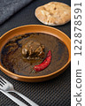 Traditional Tunisian Mloukhia with red pepper  122878591