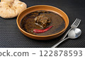 Traditional Tunisian molokhia with beef 122878593
