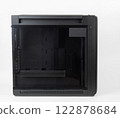 Side view of empty  big tower, PC case, chassis,  tempered-glass left panel has a mesh window to aid in graphics-card ventilation 122878684
