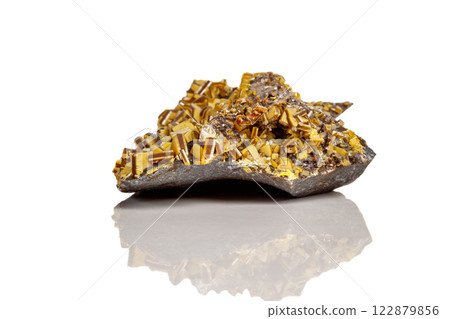 Macro mineral stone yellow Wulfenite on a white background Macro mineral stone yellow Wulfenite on a white background 122879856